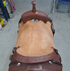 New Cutting Saddle by Fort Worth Saddle Co with 17 inch seat. Hermann Oak leather. Roughout contact points and skirt. Hand tooled rear chassis, cantle, and pommel. Gullet size is 7 inch, weight is 36lbs, and skirt is 28.75 inch. Made in USA. Limited lifetime warranty.

S1488