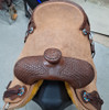 New Cutting Saddle by Fort Worth Saddle Co with 15.5 inch seat. Hermann Oak leather. Roughout contact points and skirt. Hand tooled rear chassis, cantle, and pommel. Gullet size is 7.5 inch, weight is 36lbs, and skirt is 28.5 inch. Made in USA. Limited lifetime warranty.

S1493