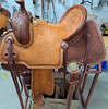 New All Around Saddle by Fort Worth Saddle Co with 13.5 inch seat. Chestnut Hermann Oak leather. Roughout contact points. Hand tooling. Pencil roll seat. Six saddle strings. Gullet size is 8 inch, weight is 28lbs, and skirt is 26.5 inch. Made in USA. Limited lifetime warranty.

S1539