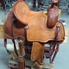 New All Around Saddle by Fort Worth Saddle Co with 13.5 inch seat. Chestnut Hermann Oak leather. Roughout contact points. Hand tooling. Pencil roll seat. Six saddle strings. Gullet size is 8 inch, weight is 28lbs, and skirt is 26.5 inch. Made in USA. Limited lifetime warranty.

S1539