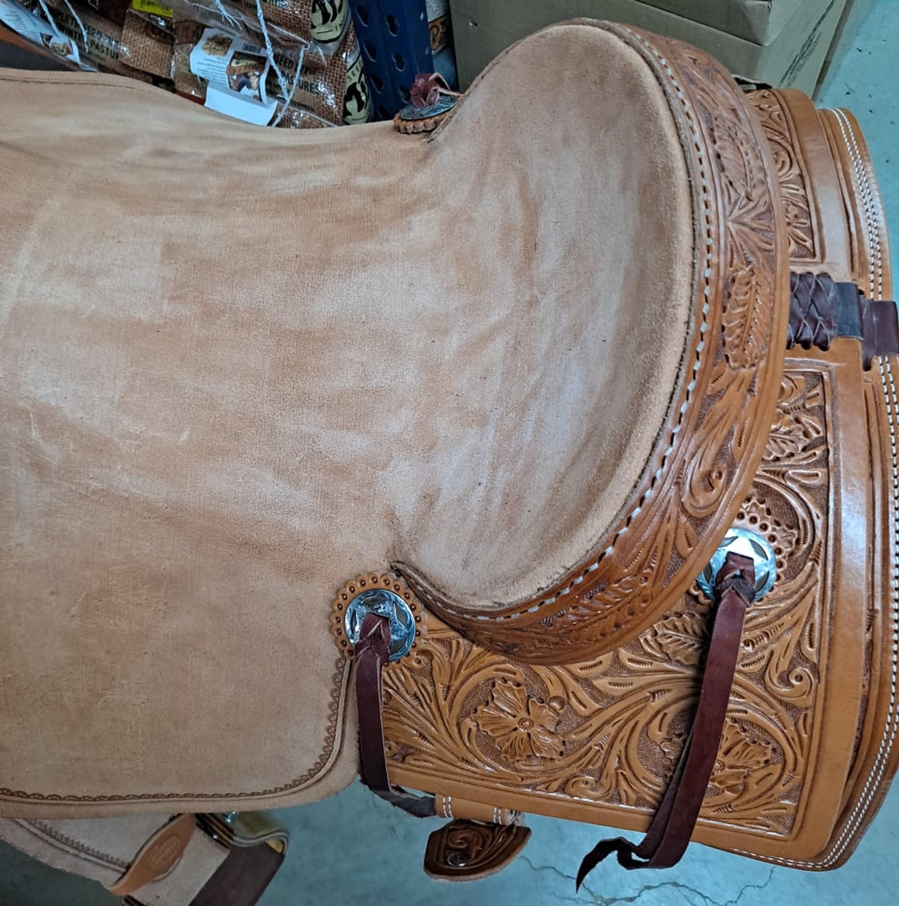 New Cutting Saddle by Fort Worth Saddle Co with 17 inch seat. Hermann Oak leather. Square skirt, floral hand tooling. Roughout contact points. Gullet size is 7.25 inch, weight is 30lbs, and skirt is 30 inch. Made in USA. Limited lifetime warranty.

S1388