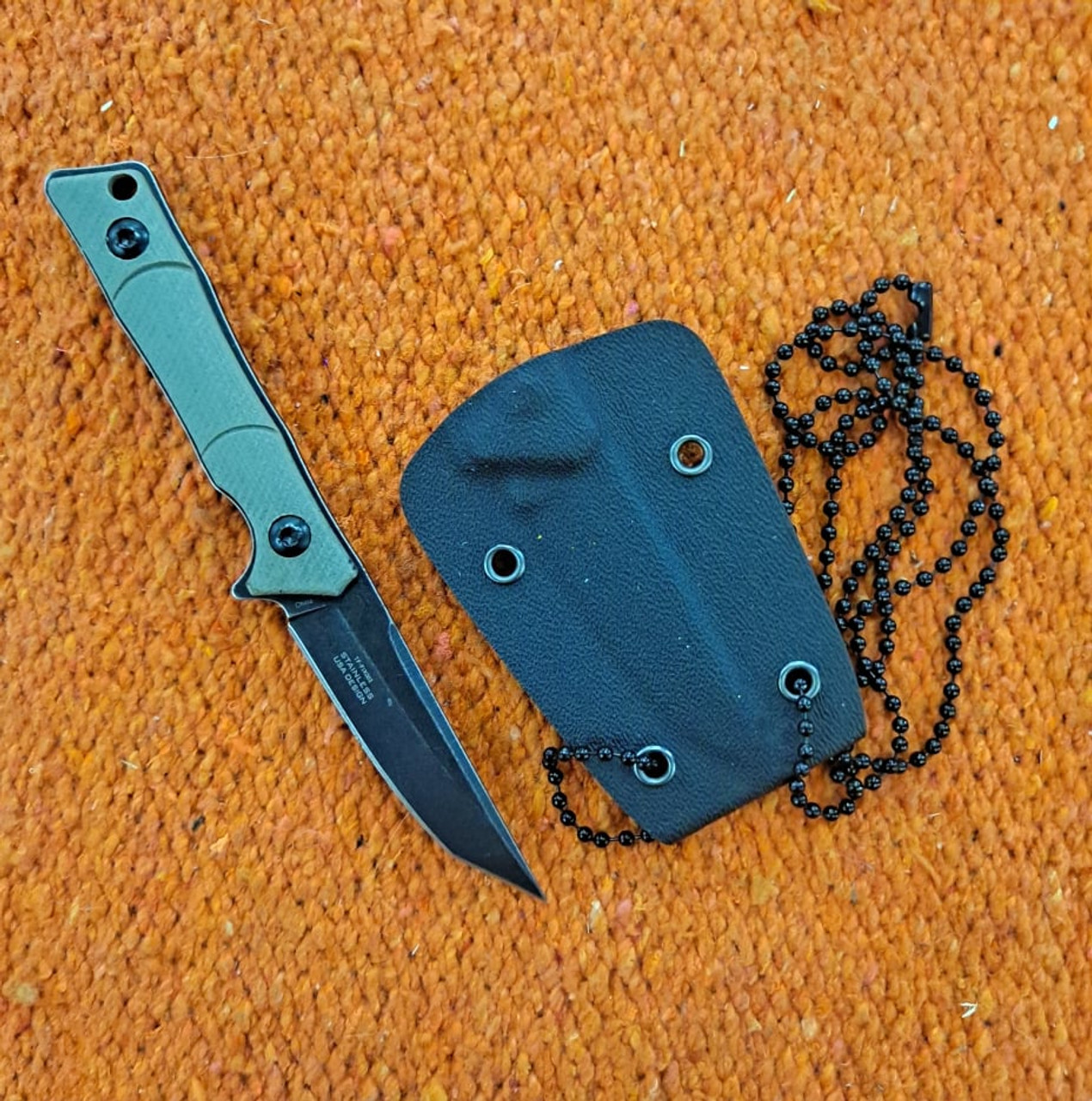 TacForce Trapper.Stainless Steel. Total length is 4.75 inches with 2 inch blade. Handle is Mixed. Neck sheath included. Tanto blade. Comes with Kydex neck sheath with chain.