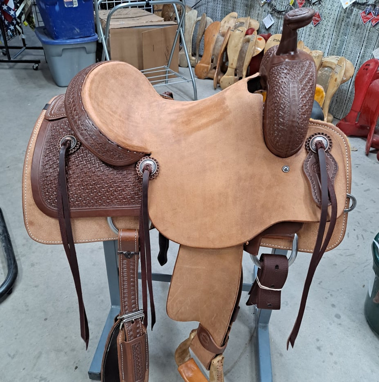 New Ranch Cutter by Fort Worth Saddle Co with 15 inch seat. Hermann Oak leather. Roughout contact points and skirt. Hand tooled rear chassis, cantle, and pommel. Gullet size is 7 inch, weight is 35lbs, and skirt is 27.5 inch. Made in USA. Limited lifetime warranty.

S1485