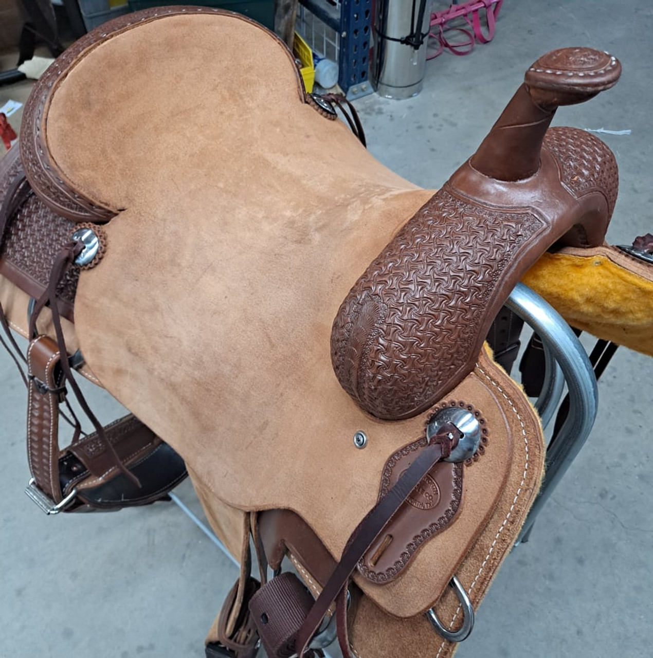 New Cutting Saddle by Fort Worth Saddle Co with 17 inch seat. Hermann Oak leather. Roughout contact points and skirt. Hand tooled rear chassis, cantle, and pommel. Gullet size is 7 inch, weight is 36lbs, and skirt is 28.75 inch. Made in USA. Limited lifetime warranty.

S1488