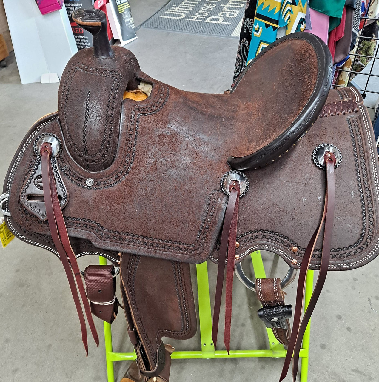 New All Around Saddle by Fort Worth Saddle Co with 14 inch seat. Chocolate roughout Hermann Oak leather. Secure pencil roll seat. 6 strings. Gullet size is 8 inch, weight is 30lbs, and skirt is 26 inch. Made in USA. Limited lifetime warranty.

S1533