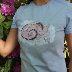 Women's t-shirt featuring art depicting a cat-dragon on a cloud Women's t-shirt featuring art depicting a cat-dragon on a cloud