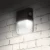 Simply Conserve 15W LED mini wall pack with black housing, clear polycarbonate lens, and integrated photocell