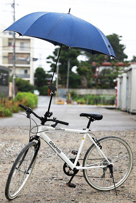 cycling with umbrella