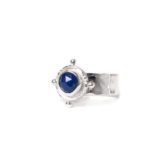 sterling silver medallion style ring with dark blue lapis gemstone cabochon sterling silver medallion style ring with dark blue lapis gemstone cabochon