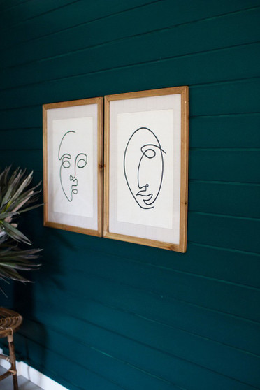 Decorative Set Of Two Face Prints Under Glass