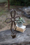 Decorative Recycled Metal Sister Clara'S Cross On A Caged Rock Base