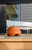 Polk Atrium Sub 100 – Outdoor 10" Subwoofer outdoor deck patio brown orange Polk Atrium Sub 100 – Outdoor 10" Subwoofer outdoor deck patio brown orange