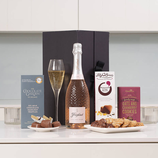 Pink Fizz Celebration Gift Box with Freixenet Italian Rosé, Lily O’Brien’s chocolates, Chocolate Garden hazelnut truffles, and Grahams oat & cranberry cookies—luxury Irish hamper perfect for birthdays, thank-you gifts, or stylish celebrations.