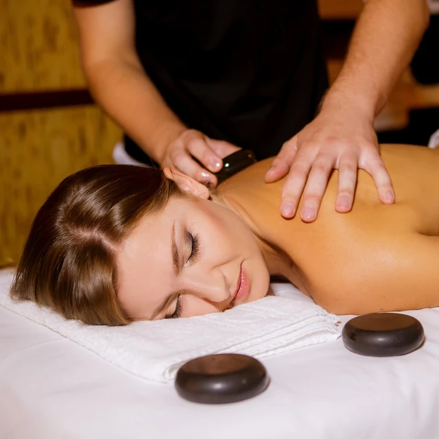 Vitality Spa Break Package featuring a relaxing back massage with hot stone therapy – rejuvenating wellness experience for stress relief and self-care.