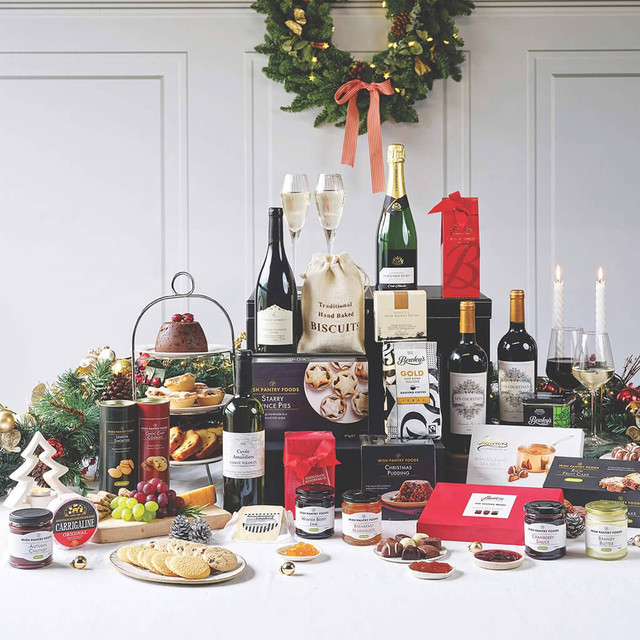 The Silent Night Irish Food Hamper with sparkling wine, red and white wine, Irish cheese, Christmas pudding and luxury festive treats from Gifts Direct