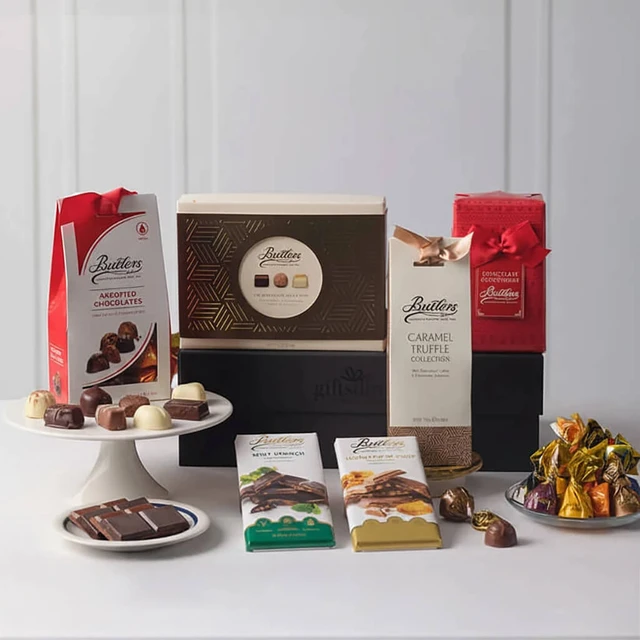 The Butlers Gift Box featuring assorted luxury chocolates, caramel truffle collection, chocolate bars, and festive treats elegantly arranged – available at GiftsDirect.com
