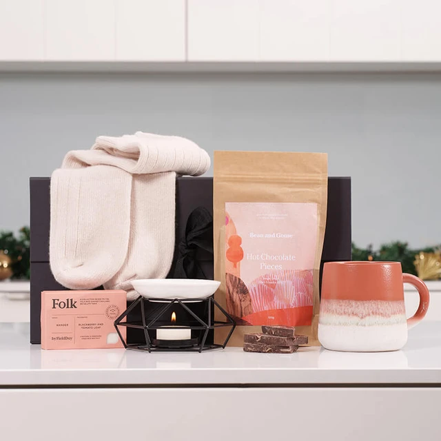 Cosy Night In Hamper with luxury lounge socks, hot chocolate, ceramic mug and relaxing self care gifts from Gifts Direct