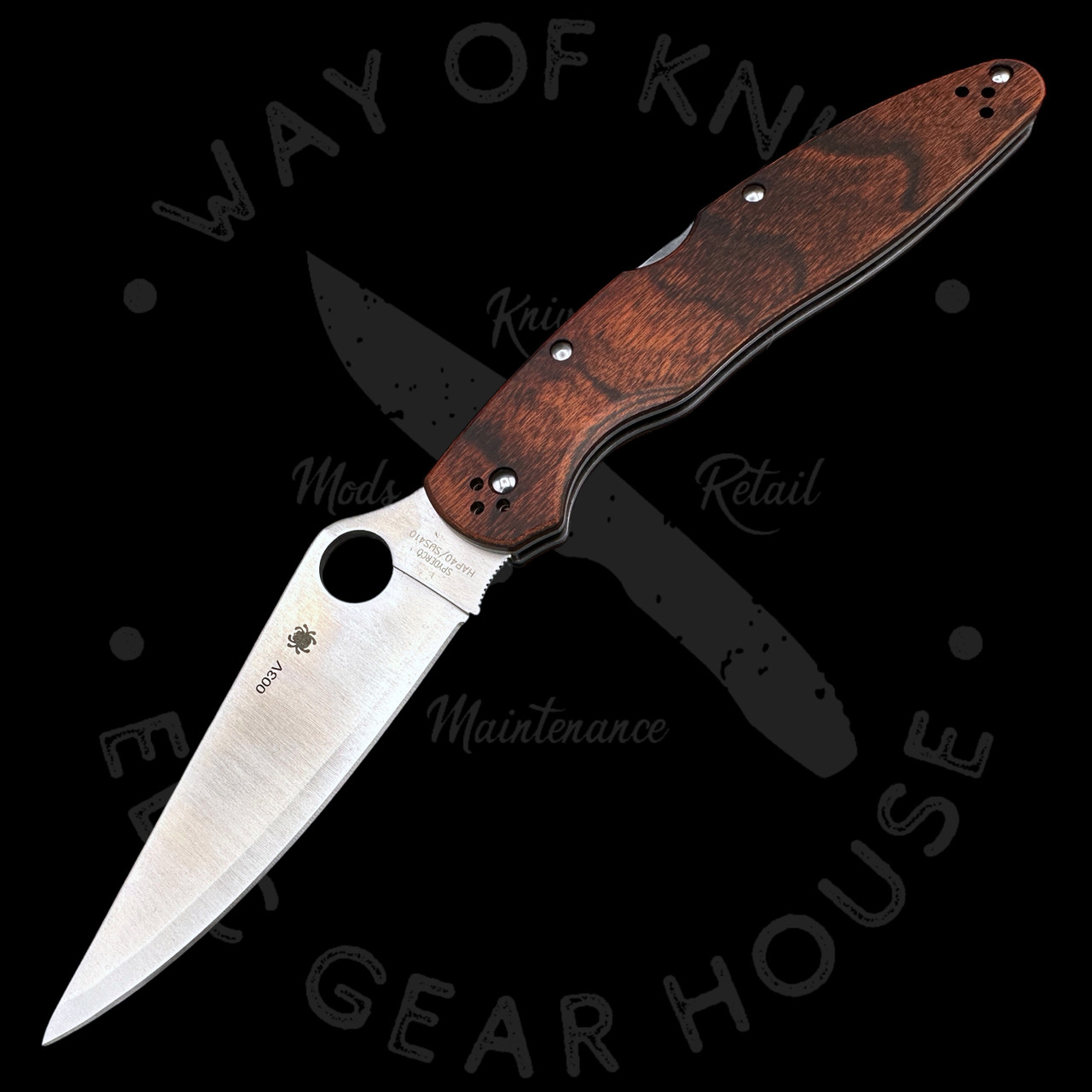 Pre Owned* 003 Spyderco Police 4 Pakkawood HAP40/SUS410 (4.41 