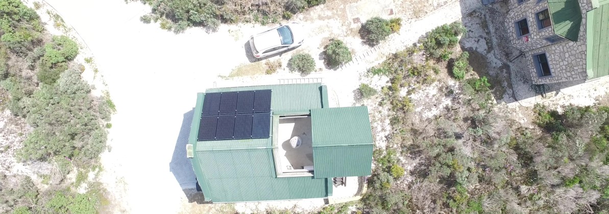 Off-grid - solar panels on roof.