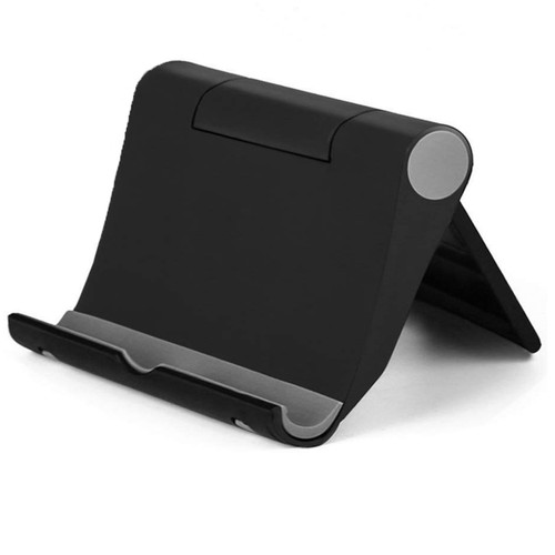 Foldable tablet and phone desk stand holding a tablet upright