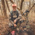 Malta Hunting Ultralight Tree Stand Harness Kit - bowhunter kneeling with a harvested hog while wearing the harness