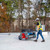 Tie Down PX3 Penetrating Mobile Fall Protection Cart, 5 Workers, SKU 72810, Roofing crew tied off to the Tie Down PX3 cart on a low slope roof