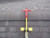 RidgePro anchor attaching over the ridge of a shingle roof to establish a strong anchor point.  