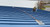 Worker using two SSRA3 Anchor Plate assemblies  attached with SSRA1 Anchors to a standing seam roof system for horizontal lifeline attachment. Worker using two SSRA3 Anchor Plate assemblies  attached with SSRA1 Anchors to a standing seam roof system for horizontal lifeline attachment.