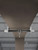 Frontline ST-AH slider anchor installed on the bottom flange of a steel I-beam overhead