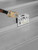 Frontline RO2W two-way standing seam anchor clamped onto a standing seam metal roof