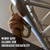 Malta Dynamics C1002 tower hook carabiner clipped to a large structural member in use