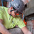 Worker on a jobsite wearing Malta Dynamics APEX safety goggles