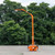 Malta X500A mobile grabber telescoping mast extended for an overhead anchor point on the jobsite