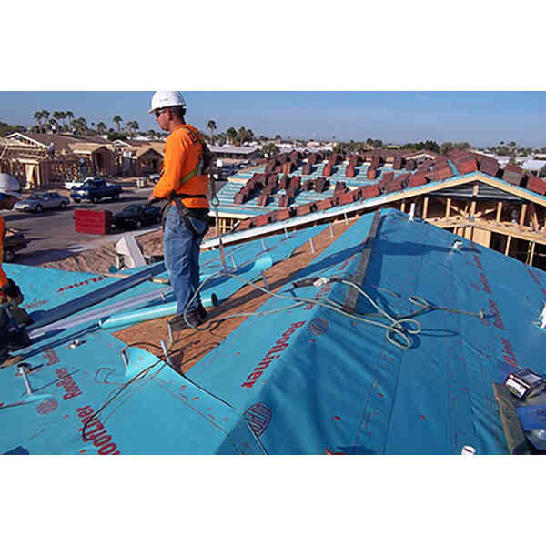 Super Anchor 3013-D Hinge-2 Reusable Roof Anchor - 3-Pack Worker tied off to a Super Anchor 3013-D Hinge-2 anchor at the ridge during tile loading