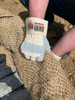 1700_ - 1700L - 122792 - Worker wearing Premium split leather palm work glove working outdoors.
