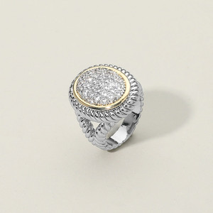 Textured Spark Two Tone CZ Stone Paved Round Statement Ring Size 9 - Two ToneColor: Two Tone

A striking round statement ring featuring a shimmering center framed by intricate detailing for a bold, polished finish. Its sculpted band adds dimension and elegance, making it an ideal accessory for enhancing both everyday looks and refined, occasion-ready styles.

• Size : 0.8" H

• CZ Cubic Zirconia