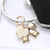 Sweet Style Metal Bow Pearl Beaded Heart Keychain / Bag Charm - Cream