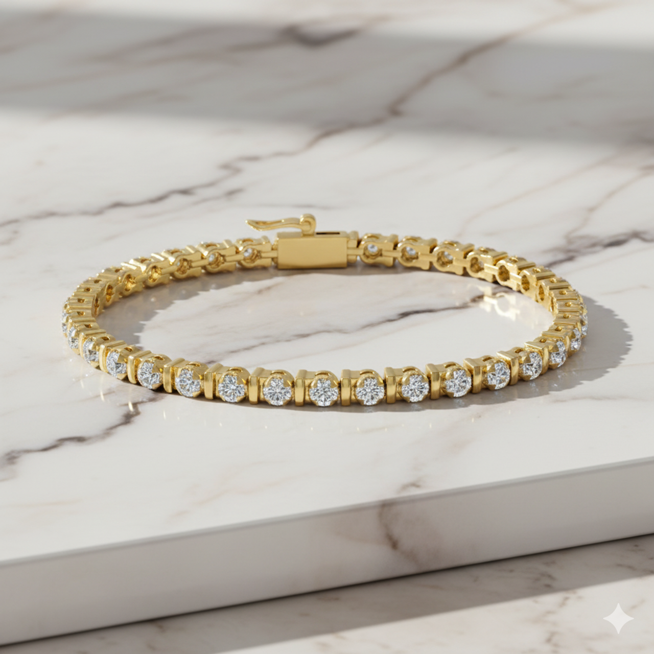 Lifestyle view of a 14K yellow gold tennis bracelet, coiled to show the seamless path of framed round diamonds on a marble background.