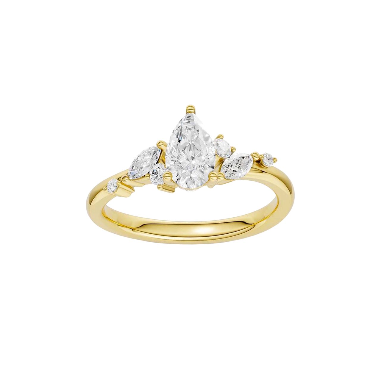 A top-down view of a 14K yellow gold ring with a three-stone cluster of round and pear-shaped gems.