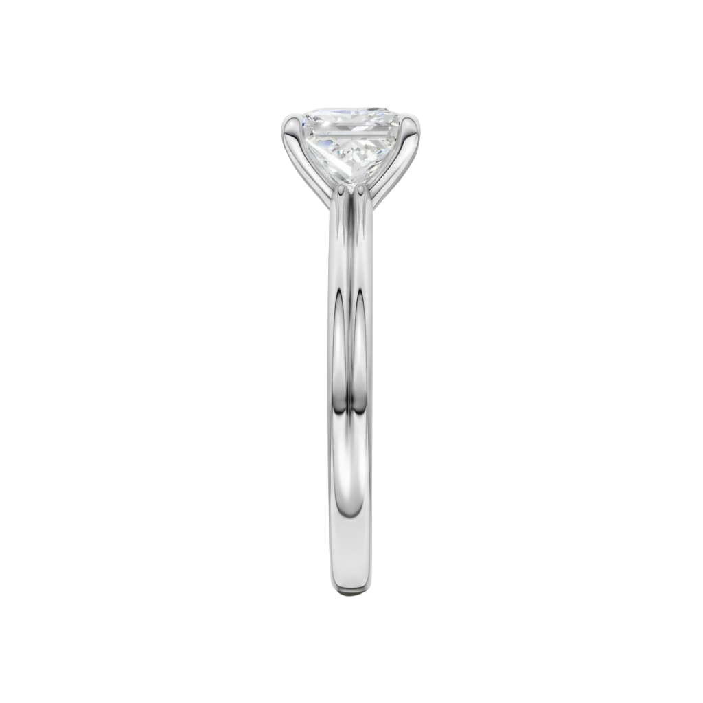 A side view of the Princess cut diamond engagement ring in platinum with a plain band and solitaire setting