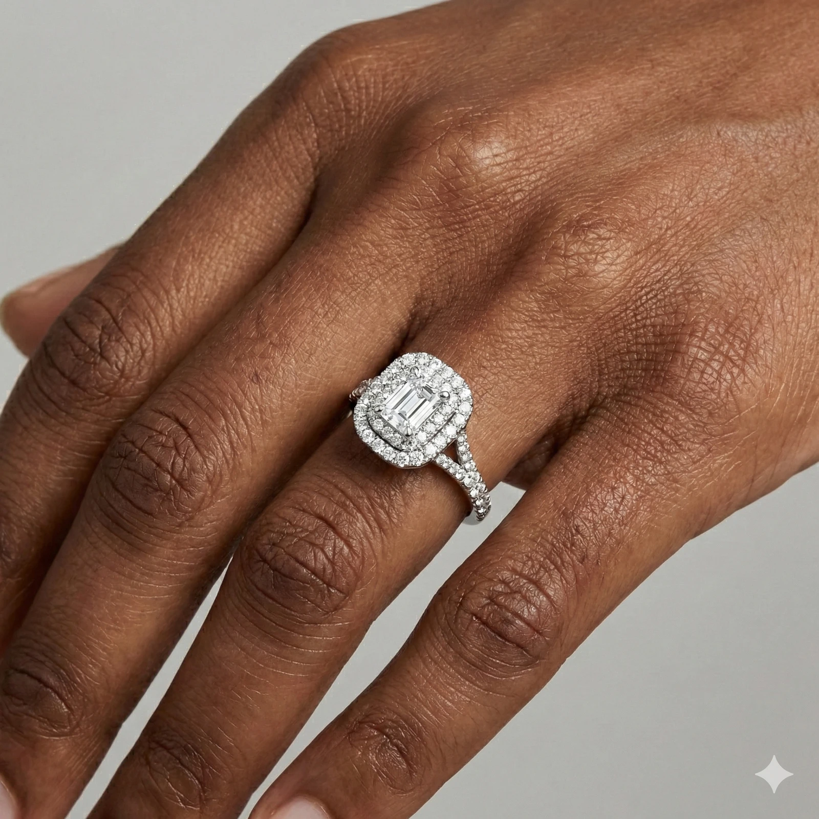 Radiant cut diamond engagement ring in 14k white gold with a prong diamond band and split setting on a hand