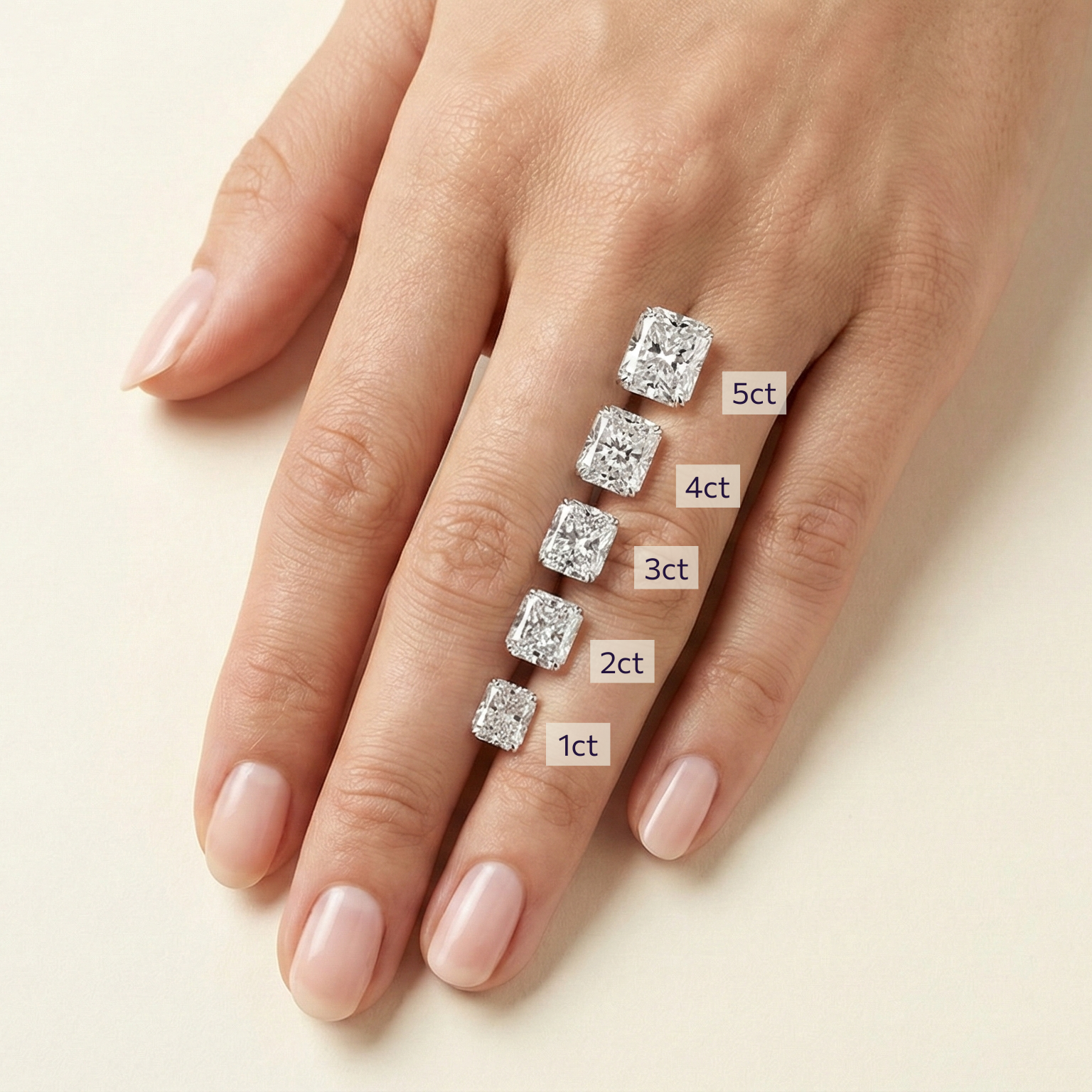 Diamond carat sizes on a hand