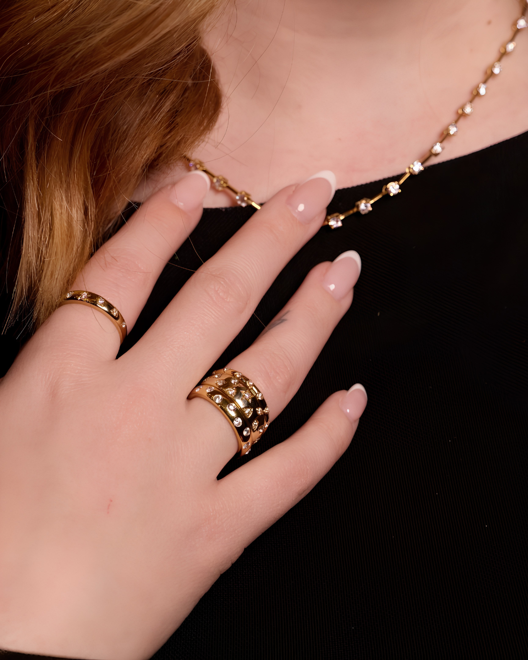 A bold, high-polish 14k yellow gold statement ring from the Amorati Fourteen Collection, featuring scattered star and geometric insets with shimmering round lab-grown diamonds.