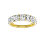 A top-down view of a 14K yellow gold wide band ring with five horizontally-set emerald-cut diamonds.