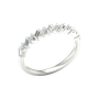 An angled view of a 14K white gold band ring, showcasing the brilliant, alternating pattern of diamonds.