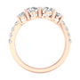 Front profile of an Amorati lab-grown diamond ring, highlighting the secure four-prong settings and the elegant curve of the rose gold band. The stones are arranged in a dynamic, wave-like formation.