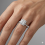Princess cut diamond engagement ring in 14k white gold with a prong diamond band and cathedral setting on a hand