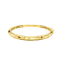 A bold, high-polish 14k yellow gold statement bangle by Amorati featuring scattered star and geometric insets with shimmering round-cut lab-grown diamonds. Amorati’s signature F O U R T E E N T H Collection