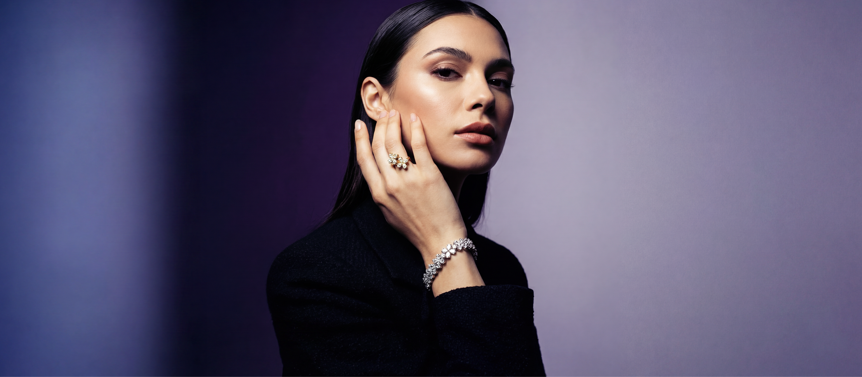 Model wearing the Amorati Signature Collection cocktail ring and diamond bracelet
