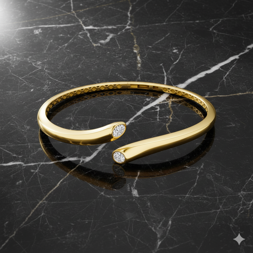 A wide-angle view of a 14K yellow gold open cuff bracelet, showcasing the entire design with two bezel-set diamonds at each end on a marble background.